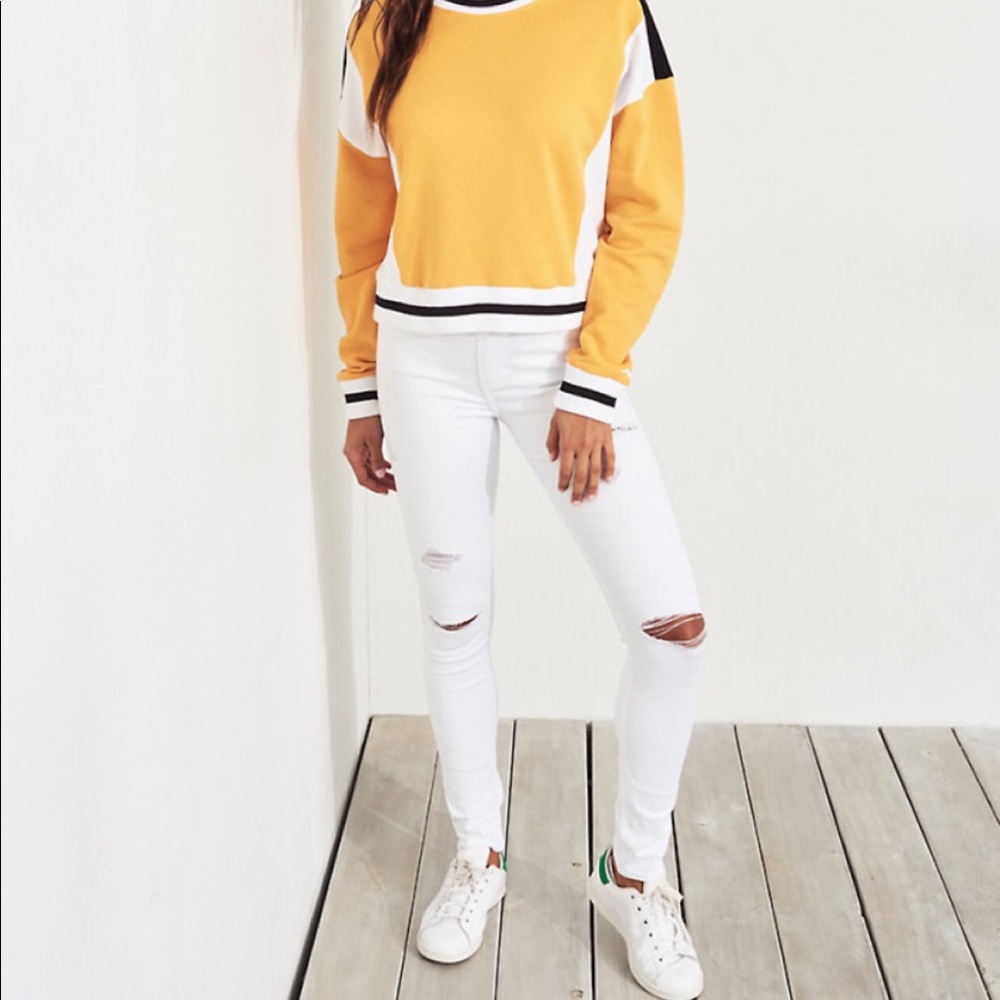 White Hollister high-waisted skinny ripped jeans